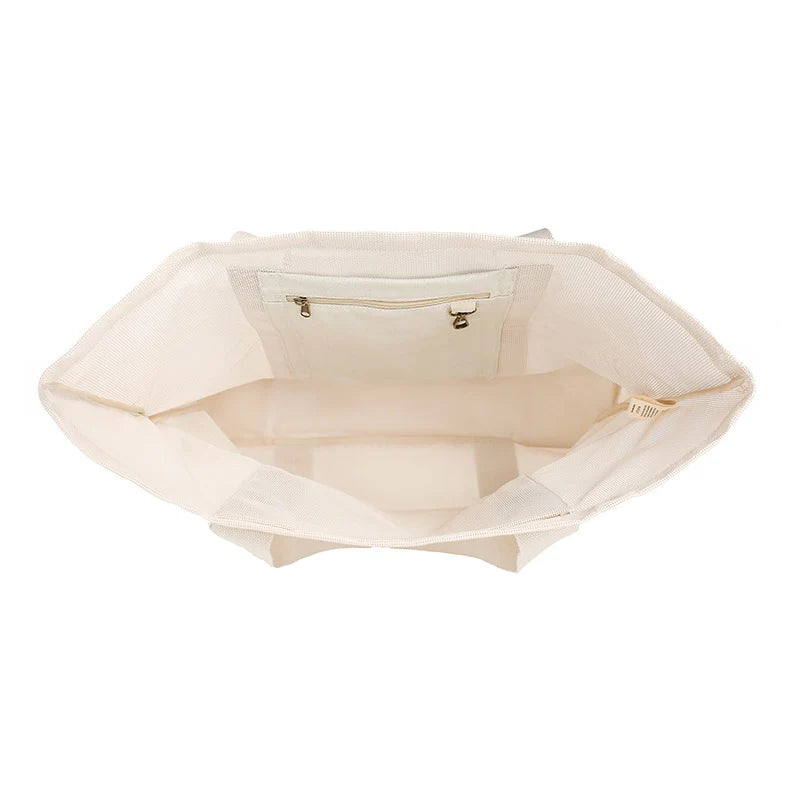 Sande Kids mesh beach bag neutral sand top view inside