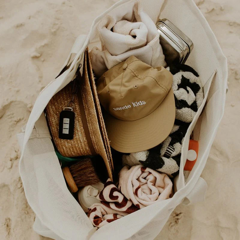 Sande Kids beach hauler bag filled with beach essentials.